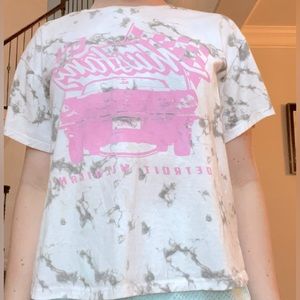 Tie-dye, white and gray with a pink car on the front